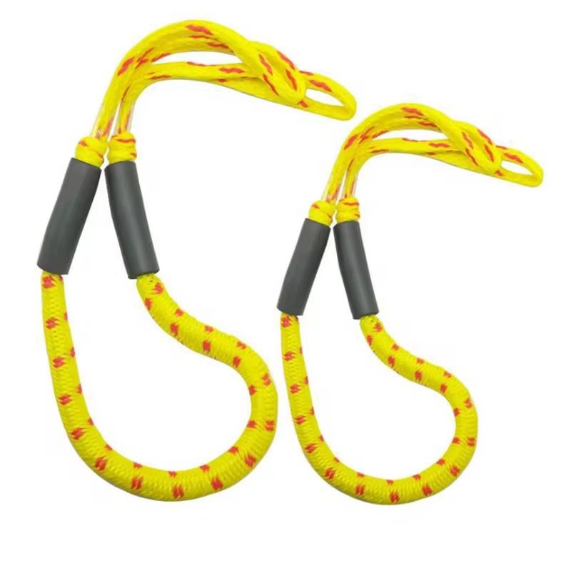 Yellow and red UHMWPE soft shackle pair with rubber grip sleeves and spliced eye terminations