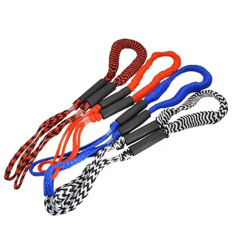 Four UHMWPE soft shackles in the colour range: red/black, orange, blue, and white/black